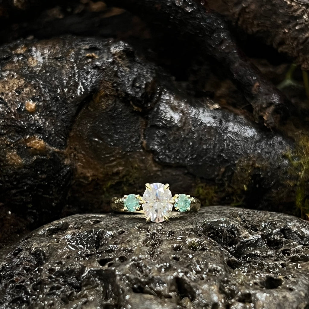 Into The Woods-Mullaghmeen- 2ct Moissanite with Pale Teal Moissanite side stones-9ct Yellow Gold